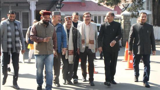 BJP leaders walk out of the House for the second consecutive day of the Himachal assembly session over the ongoing dispute on lifting water from Ali Khad. (Deepak Sansta/HT)