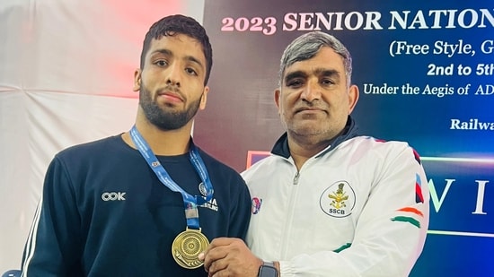 Sujeet Kalkal (left) won national title in 65kg weight class in Jaipur (HT)