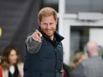 Prince Harry considers return to royal duties to support father during cancer battle. (Photo by Don MacKinnon / AFP) Prince Harry considers return to royal duties to support father during cancer battle. (Photo by Don MacKinnon / AFP)