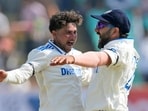 India's Kuldeep Yadav, left, celebrates with captain Rohit Sharma India's Kuldeep Yadav, left, celebrates with captain Rohit Sharma