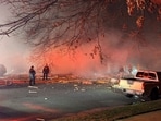 First responders work the scene after an explosion at a house, late Friday, Feb. 16, 2024, in Sterling, Va. (Nicki Jhabvala/The Washington Post via AP) First responders work the scene after an explosion at a house, late Friday, Feb. 16, 2024, in Sterling, Va. (Nicki Jhabvala/The Washington Post via AP)