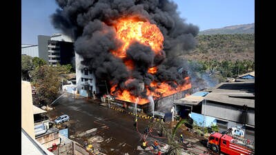 :A after massive fire broke out in Sujan Chemoplast, a company beside its M/s. L.Liladhar also caught fire, at Pawane MIDC in Navi Mumbai on Saturday. (Bachchan Kumar/ HT PHOTO)