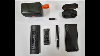 Electronic gadgets allegedly recovered from the cells of National Security Act (NSA) detenues at Dibrugarh Central Jail, in Dibrugarh on Saturday. (PTI)