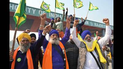 Farmers shout slogans as they staged a demonstration in support of farmers, protesting at Shambhu near the Punjab-Haryana state border over minimum price for their crops, on the outskirts of Amritsar on Saturday. (AFP)