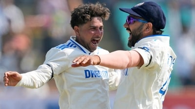 India's Kuldeep Yadav, left, celebrates with captain Rohit Sharma (AP) India's Kuldeep Yadav, left, celebrates with captain Rohit Sharma (AP)