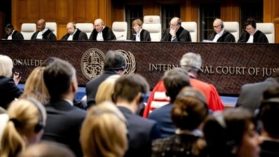The judges including President Joan Donoghue (C) attend a session of the International Court of Justice (ICJ) in a case of Ukraine against Russia, in The Hague on February 2, 2024. The United Nations' top court will decide on February 2, 2024, whether it has jurisdiction to rule in a case brought by Ukraine over Russia's brutal 2022 invasion, with Kyiv urging reparations. Two days into the invasion, Ukraine filed a suit at the ICJ, "emphatically denying" that pro-Russian people in eastern Ukraine had been "subjected to bullying and genocide by the Kyiv regime" according to Moscow, and arguing that Russia's use of "genocide" as a pretext went against the 1948 UN Genocide Convention. (Photo by Sem van der Wal / ANP / AFP) / Netherlands OUT (AFP) The judges including President Joan Donoghue (C) attend a session of the International Court of Justice (ICJ) in a case of Ukraine against Russia, in The Hague on February 2, 2024. The United Nations' top court will decide on February 2, 2024, whether it has jurisdiction to rule in a case brought by Ukraine over Russia's brutal 2022 invasion, with Kyiv urging reparations. Two days into the invasion, Ukraine filed a suit at the ICJ, "emphatically denying" that pro-Russian people in eastern Ukraine had been "subjected to bullying and genocide by the Kyiv regime" according to Moscow, and arguing that Russia's use of "genocide" as a pretext went against the 1948 UN Genocide Convention. (Photo by Sem van der Wal / ANP / AFP) / Netherlands OUT (AFP)