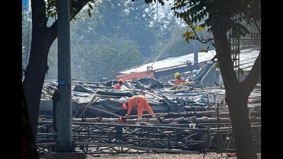 New Delhi, India - Feb. 17, 2024: NDRF, along with the Delhi Police and fire department, carries out rescue operations after a temporary structure gets collapsed inside JLN Stadium, injuring several workers in New Delhi, India, on Saturday, February 17, 2024. (Photo by Sanchit Khanna/ Hindustan Times) (Hindustan Times) New Delhi, India - Feb. 17, 2024: NDRF, along with the Delhi Police and fire department, carries out rescue operations after a temporary structure gets collapsed inside JLN Stadium, injuring several workers in New Delhi, India, on Saturday, February 17, 2024. (Photo by Sanchit Khanna/ Hindustan Times) (Hindustan Times)