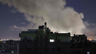 Smoke billows over buildings during Israeli bombardment south of Rafah in the southern Gaza Strip near the border with Egypt on February 17, 2024, amid ongoing battles between Israel and the Palestinian militant group Hamas. (AFP) Smoke billows over buildings during Israeli bombardment south of Rafah in the southern Gaza Strip near the border with Egypt on February 17, 2024, amid ongoing battles between Israel and the Palestinian militant group Hamas. (AFP)