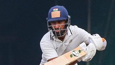 Cheteshwar Pujara struck his 63rd first-class century (PTI) Cheteshwar Pujara struck his 63rd first-class century (PTI)