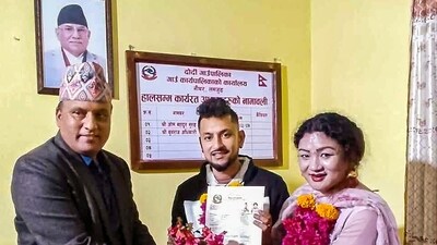 Maya Gurung and Surendra Pandey receive their marriage certificate after legally registering same-sex marriage, at Dordi Rural Municipality of Lamjung district in Western Nepal. Nepal registered the first female-female same-sex marriage, between Anju Devi Shrestha and Suprita Gurung in Bardiya district (PTI) Maya Gurung and Surendra Pandey receive their marriage certificate after legally registering same-sex marriage, at Dordi Rural Municipality of Lamjung district in Western Nepal. Nepal registered the first female-female same-sex marriage, between Anju Devi Shrestha and Suprita Gurung in Bardiya district (PTI)