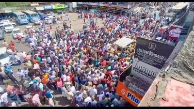 People block the traffic after an eco-tourism guide died due to elephant attack, in Wayanad, Kerala, Saturday. (PTI) People block the traffic after an eco-tourism guide died due to elephant attack, in Wayanad, Kerala, Saturday. (PTI)