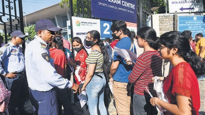 Students arrive to appear for the first slot of CUET-UG at North campus in New Delhi on July 15, 2022. (HT Photo)