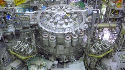 TOPSHOT - This undated handout image taken and received by the National Institutes for Quantum Science and Technology (QST) on December 1, 2023 shows the JT-60SA, the world's biggest nuclear fusion reactor constructed to date, before its planned inauguration in the city of Naka, Ibaraki prefecture on December 1. Harnessing nuclear fusion, the same process which powers the Sun, has been described as potentially humanity's best energy source for the future but the technology is in its infancy. (AFP) TOPSHOT - This undated handout image taken and received by the National Institutes for Quantum Science and Technology (QST) on December 1, 2023 shows the JT-60SA, the world's biggest nuclear fusion reactor constructed to date, before its planned inauguration in the city of Naka, Ibaraki prefecture on December 1. Harnessing nuclear fusion, the same process which powers the Sun, has been described as potentially humanity's best energy source for the future but the technology is in its infancy. (AFP)