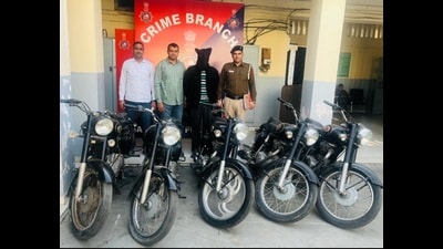 The accused taxi driver and recovered motorcycles in the custody of Chandigarh Police. (HT PHOTO)