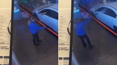 The image, taken from a viral X video, shows a car washer's reaction to a rude customer. (X/@CollinRugg) The image, taken from a viral X video, shows a car washer's reaction to a rude customer. (X/@CollinRugg)