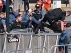 Law enforcement personnel clear the area around Union Station following a shooting at the Kansas City Chiefs NFL football Super Bowl celebration in Kansas City, Mo., Wednesday, Feb. 14, 2024. (AP Photo/Reed Hoffmann, File)