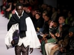 A model presents a creation at the Robyn Lynch catwalk show during the London Fashion Week, in London. 