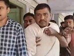 TMC leader Shibaprasad Hazra being presented before the Basirhat subdivision court in connection with the Sandeshkhali incident in North 24 Parganas district on Sunday (PTI)
