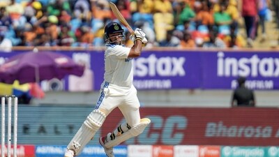 "Sarfaraz being Sarfaraz..." - It was a debut Test to remember for Sarfaraz Khan, who smashed half-centuries in both the innings of the Rajkot Test.&nbsp; (BCCI-X)