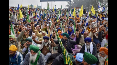 Farmers listen to a leader at the Punjab-Haryana Shambhu border during their 'Delhi Chalo' protest, near Patiala district, on Sunday. (PTI) Farmers listen to a leader at the Punjab-Haryana Shambhu border during their 'Delhi Chalo' protest, near Patiala district, on Sunday. (PTI)