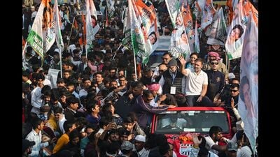 India's Congress party leader Rahul Gandhi (R) waves to his supporters from atop a vehicle during the 'Bharat Jodo Yatra' roadshow Prayagraj on February 18, 2024. (Photo by Sanjay KANOJIA / AFP) (AFP) India's Congress party leader Rahul Gandhi (R) waves to his supporters from atop a vehicle during the 'Bharat Jodo Yatra' roadshow Prayagraj on February 18, 2024. (Photo by Sanjay KANOJIA / AFP) (AFP)