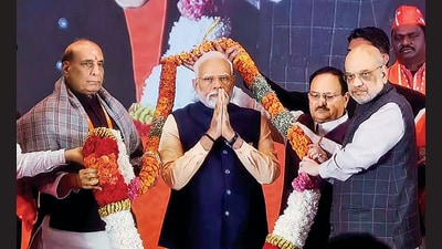 Prime Minister Narendra Modi being garlanded by Defence Minister Rajnath Singh, Union Home Minister Amit Shah and BJP President JP Nadda during the BJP National Convention 2024, in New Delhi on Sunday. (ANI) Prime Minister Narendra Modi being garlanded by Defence Minister Rajnath Singh, Union Home Minister Amit Shah and BJP President JP Nadda during the BJP National Convention 2024, in New Delhi on Sunday. (ANI)