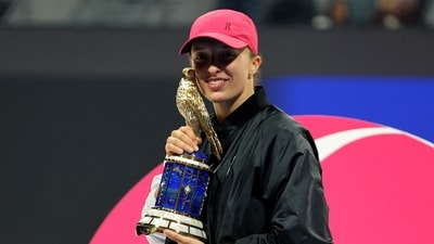 Poland's Iga Swiatek poses with the trophy after winning the final against Kazakhstan's Elena Rybakina (REUTERS)