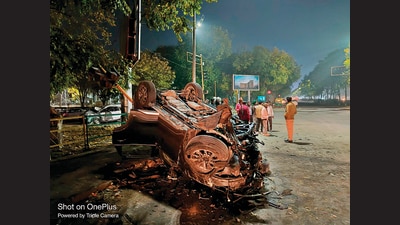 The mangled remains of the Mahindra Scorpio car that collided with a Toyota Innova near the Sector 79/80 intersection on Airport Road. A student of DAV College and a car trader were among the deceased. (HT PHOTO)