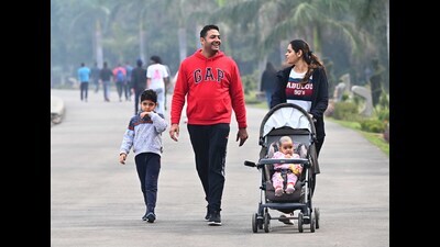 Visitors at Sukhna Lake, Chandigarh, on a cloudy Sunday. (Keshav Singh/HT)
