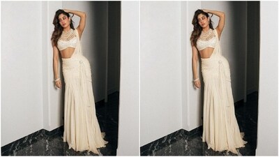 Janhvi's ethereal concept saree comes in a stunning white shade and features a modern draping pattern that lets the pleats of her saree flow gracefully at the bottom while her pallu cascades beautifully over the shoulders. The beaded embellishment all around added an extra touch of glamour. (Instagram/@janhvikapoor) Janhvi's ethereal concept saree comes in a stunning white shade and features a modern draping pattern that lets the pleats of her saree flow gracefully at the bottom while her pallu cascades beautifully over the shoulders. The beaded embellishment all around added an extra touch of glamour. (Instagram/@janhvikapoor)