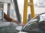 Paytm FASTag: Car seen at Gurugram-Faridabad road toll plaza near Bandhwari village, in Gurugram, India.