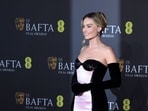 Margot Robbie poses on the red carpet at the 2024 British Academy of Film and Television Awards (BAFTA).