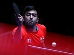 India's Harmeet Desai in action during his men's singles group stage match against South Korea's Jang Woo-jin