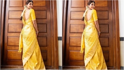 To complement her stunning saree look, Pooja paired it with a matching yellow blouse featuring a sweetheart neckline, elbow-length sleeves and intricate gold work on the neckline and hem of the sleeves, adding an extra touch of royalty. (Instagram/@hegdepooja) To complement her stunning saree look, Pooja paired it with a matching yellow blouse featuring a sweetheart neckline, elbow-length sleeves and intricate gold work on the neckline and hem of the sleeves, adding an extra touch of royalty. (Instagram/@hegdepooja)
