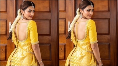 She styled her long, lustrous locks into a low ponytail with a centre part and adorned it with white flowers, which further enchanted her overall look. (Instagram/@hegdepooja) She styled her long, lustrous locks into a low ponytail with a centre part and adorned it with white flowers, which further enchanted her overall look. (Instagram/@hegdepooja)