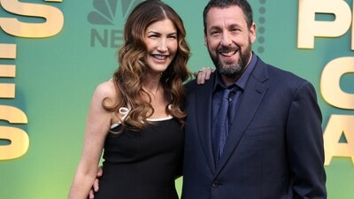 Jackie Sandler and Adam Sandler attend the awards ceremony. (REUTERS)