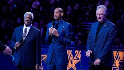 Former Indiana Pacers player Reggie Miller, center, 12-time NBA All-Star Oscar Robertson, left, and NBA legend Larry Bird speak to the fans before the start of the NBA All-Star basketball game in Indianapolis, Sunday, Feb. 18, 2024. (AP Photo/Darron Cummings) (AP) Former Indiana Pacers player Reggie Miller, center, 12-time NBA All-Star Oscar Robertson, left, and NBA legend Larry Bird speak to the fans before the start of the NBA All-Star basketball game in Indianapolis, Sunday, Feb. 18, 2024. (AP Photo/Darron Cummings) (AP)
