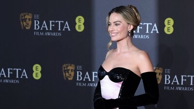 Margot Robbie poses on the red carpet at the 2024 British Academy of Film and Television Awards (BAFTA). (REUTERS)