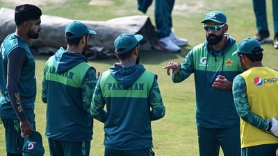 Pakistan's head coach Mohammad Hafeez (3R) speaks with cricket players during a practice session (AFP) Pakistan's head coach Mohammad Hafeez (3R) speaks with cricket players during a practice session (AFP)
