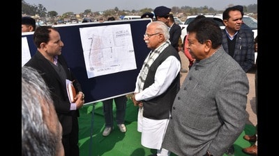 Haryana CM Manohar Lal Khattar reviewing the land earmarked for the rehabilitation of slum residents in Panchkula. (HT) Haryana CM Manohar Lal Khattar reviewing the land earmarked for the rehabilitation of slum residents in Panchkula. (HT)
