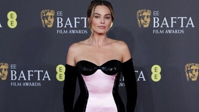 Margot Robbie dons a strapless pink and black gown from Armani Privé at BAFTA 2024 (Photo: Reuters) Margot Robbie dons a strapless pink and black gown from Armani Privé at BAFTA 2024 (Photo: Reuters)