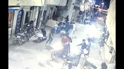 On Saturday at around 9:45 pm, Sapate again argued with Raje over parking space following which he along with 10-12 others attempted to set Raje’s car on fire when Varsha Gaikwad was also present at the spot. (VIDEO GRAB) On Saturday at around 9:45 pm, Sapate again argued with Raje over parking space following which he along with 10-12 others attempted to set Raje’s car on fire when Varsha Gaikwad was also present at the spot. (VIDEO GRAB)