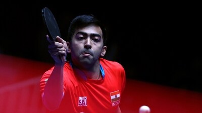 India's Harmeet Desai in action during his men's singles group stage match against South Korea's Jang Woo-jin India's Harmeet Desai in action during his men's singles group stage match against South Korea's Jang Woo-jin