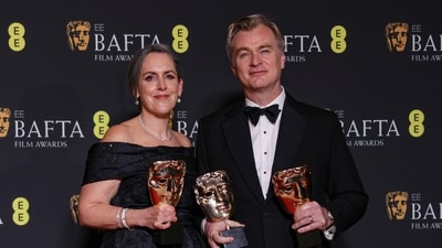 Producer Emma Thomas, left, and director Christopher Nolan, winner of the best film award and director award for Oppenheimer, pose for photographers. (Vianney Le Caer/Invision/AP) Producer Emma Thomas, left, and director Christopher Nolan, winner of the best film award and director award for Oppenheimer, pose for photographers. (Vianney Le Caer/Invision/AP)