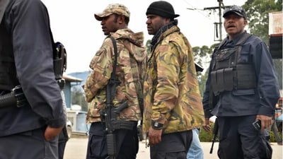 Police preparing to go on patrol outside their police station in the town of Wabag in the highlands province of Enga. (AFP) Police preparing to go on patrol outside their police station in the town of Wabag in the highlands province of Enga. (AFP)