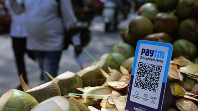 Paytm Stock Price: A QR code for the Paytm digital payment system at a roadside coconut stall in Mumbai, India. (Bloomberg) Paytm Stock Price: A QR code for the Paytm digital payment system at a roadside coconut stall in Mumbai, India. (Bloomberg)