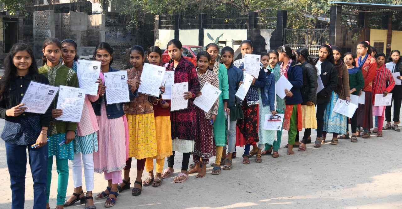 Students standing in queue to appear in the Bihar Board class 10th examination at D.D. Nandan Kanya High School Danapur in Patna 
(Photo by Santosh Kumar)