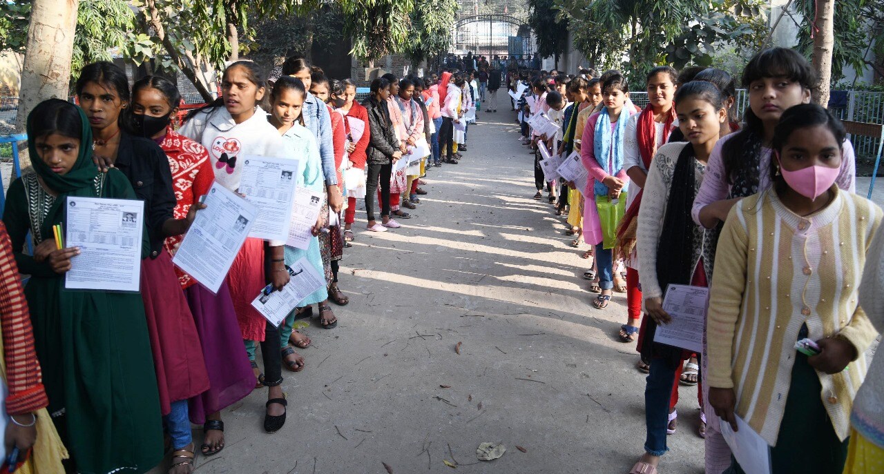 Students standing in queue to appear in the Bihar Board class 10th examination at DAV High School Danapur in Patna

Photo by Santosh Kumar