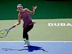Victoria Azarenka returns the ball to Arantxa Rus of the Netherlands during a match of the Dubai Duty Free Tennis Championships in Dubai