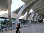A passenger is seen at the departure terminal three of Dubai Airports in Dubai, United Arab Emirates.